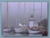 Faro e barche